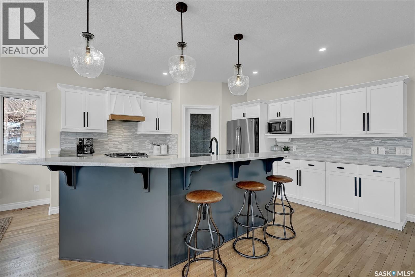 28 Emerald Creek Drive, White City, SK - Indoor Photo Showing Kitchen With Upgraded Kitchen