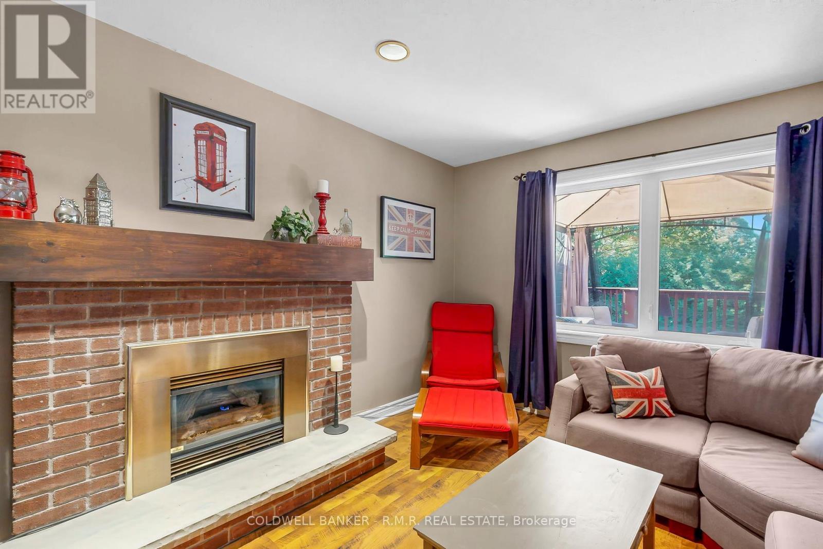 Main Floor Family Room with Gas Fireplace - 24 Testa Road, Uxbridge, ON - Indoor Photo Showing Living Room With Fireplace