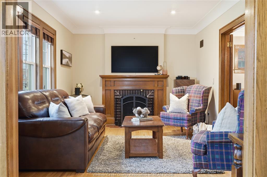 2146 Windermere, Windsor, ON - Indoor Photo Showing Living Room With Fireplace