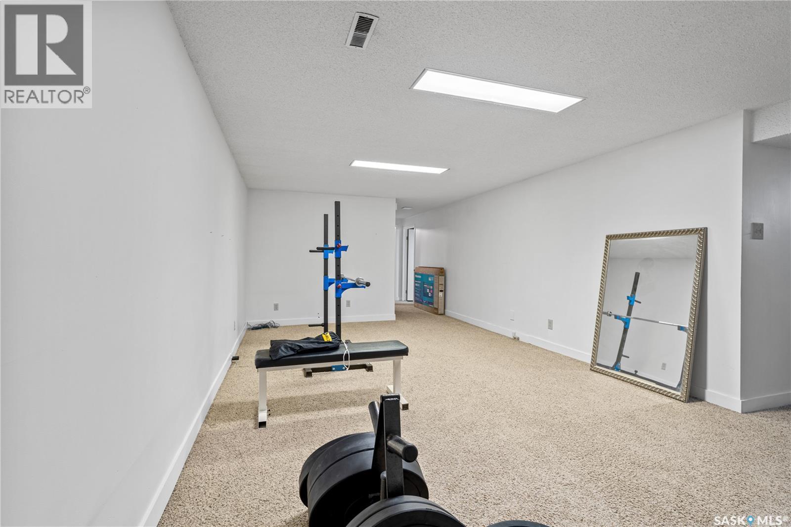 78 Wood Crescent, Regina, SK - Indoor Photo Showing Gym Room