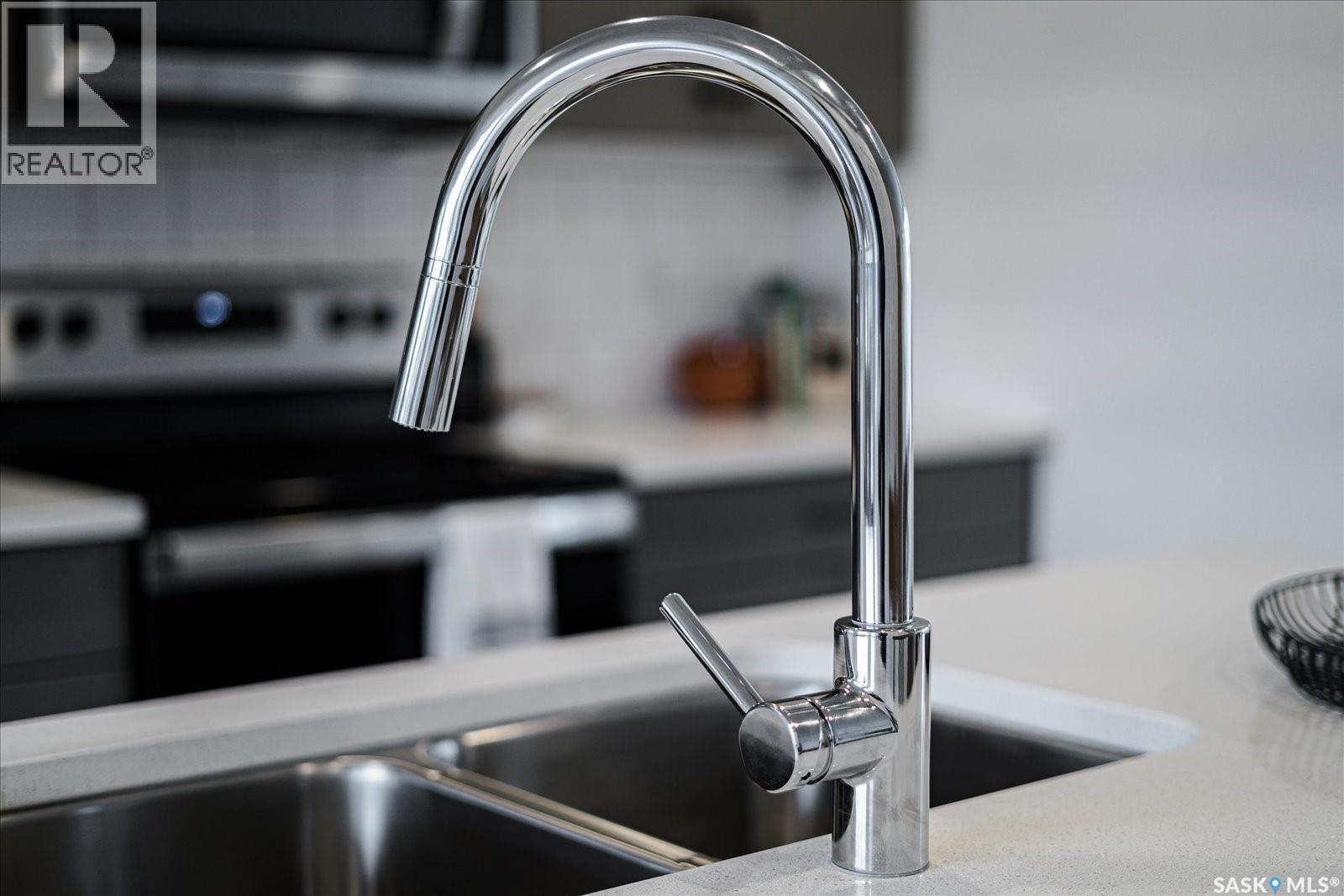 59 Rosewood Boulevard E, Saskatoon, SK - Indoor Photo Showing Kitchen With Double Sink