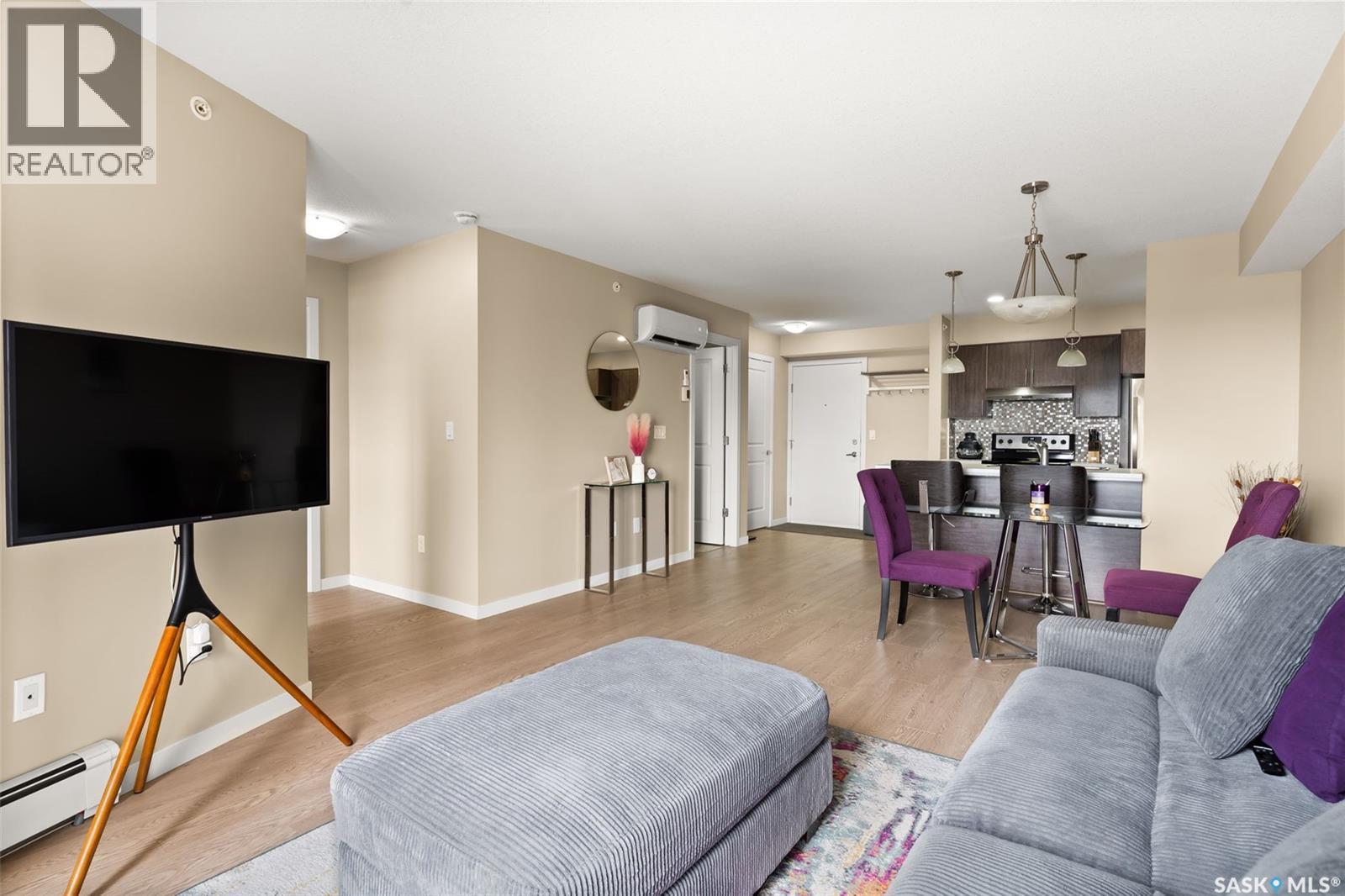1404 5500 Mitchinson Way, Regina, SK - Indoor Photo Showing Living Room