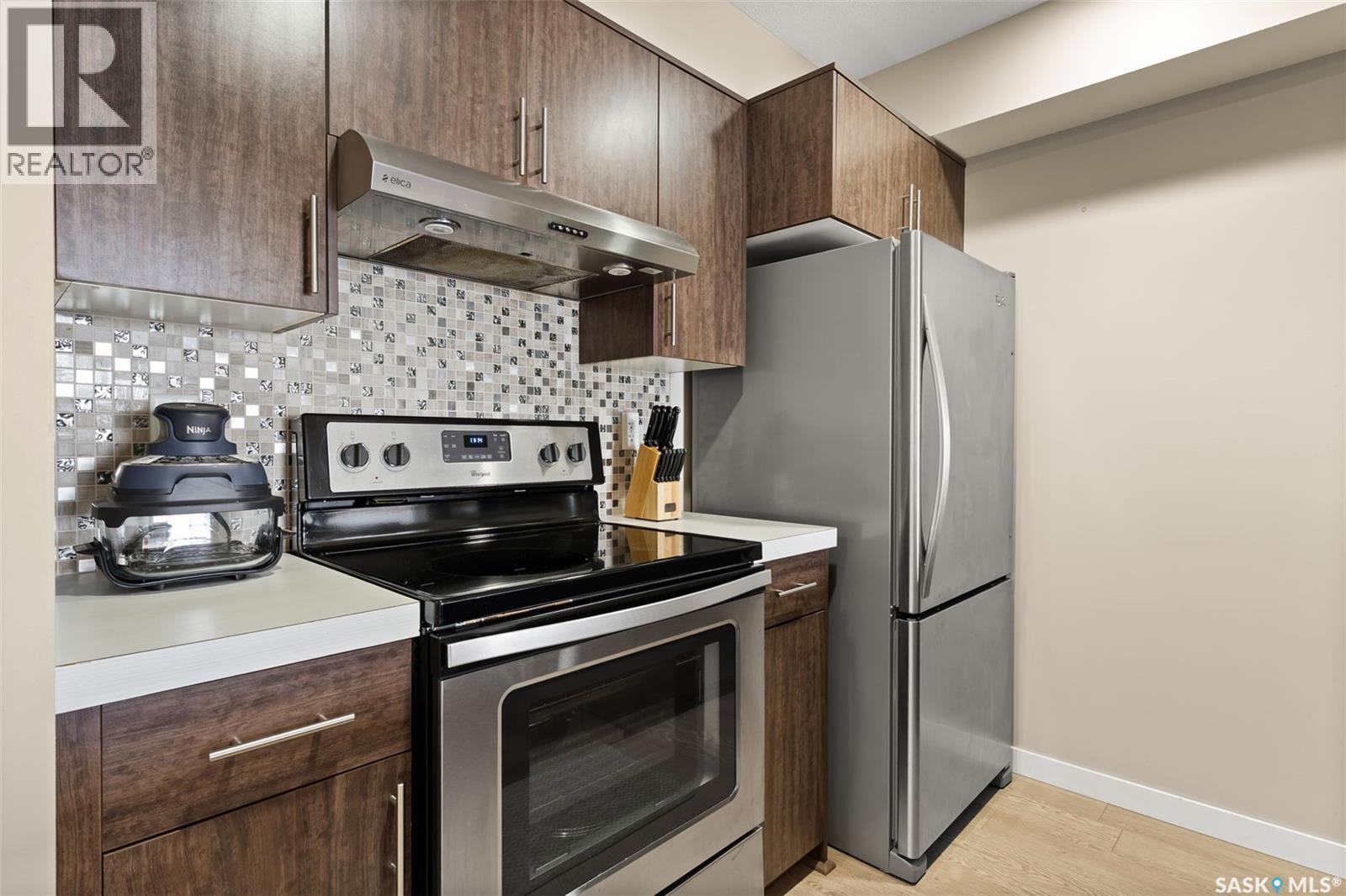 1404 5500 Mitchinson Way, Regina, SK - Indoor Photo Showing Kitchen