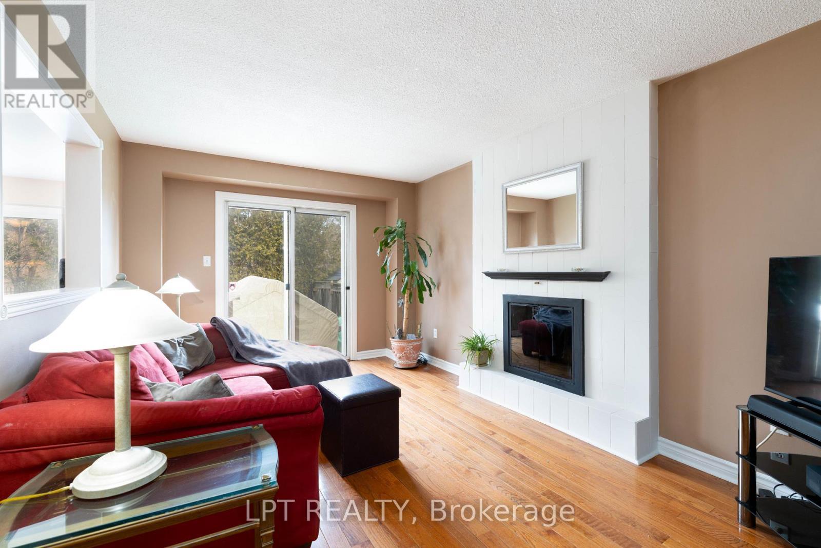 Family Room - 54 Meyer Circle, Markham, ON - Indoor Photo Showing Living Room With Fireplace