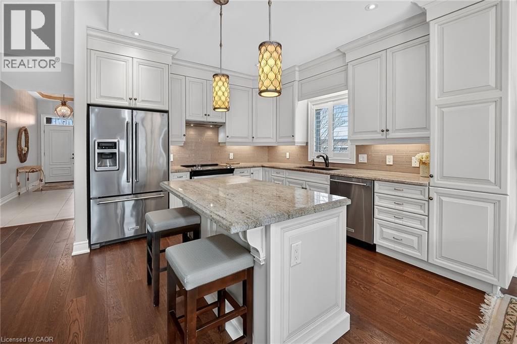 Upgraded kitchen with extended height cabinetry - 1 Cedar Drive, St. Davids, ON - Indoor Photo Showing Kitchen With Upgraded Kitchen