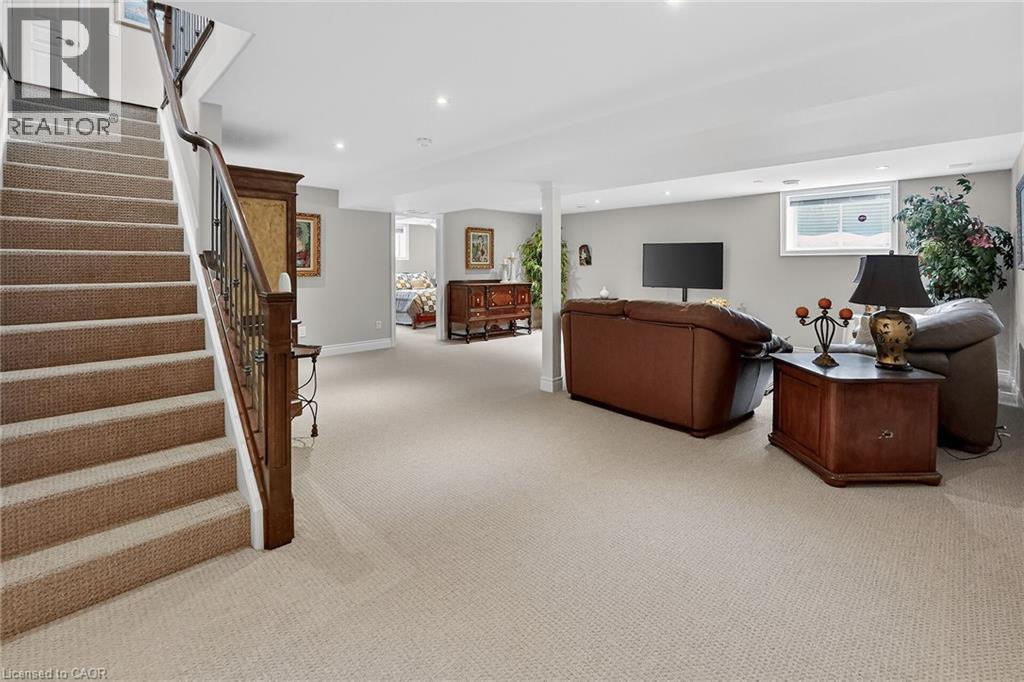 Large sunlit recreation room - 1 Cedar Drive, St. Davids, ON - Indoor