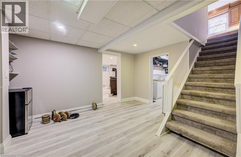 Open space currently used as home gym - 27 Lowrey Avenue S, Cambridge, ON - Indoor