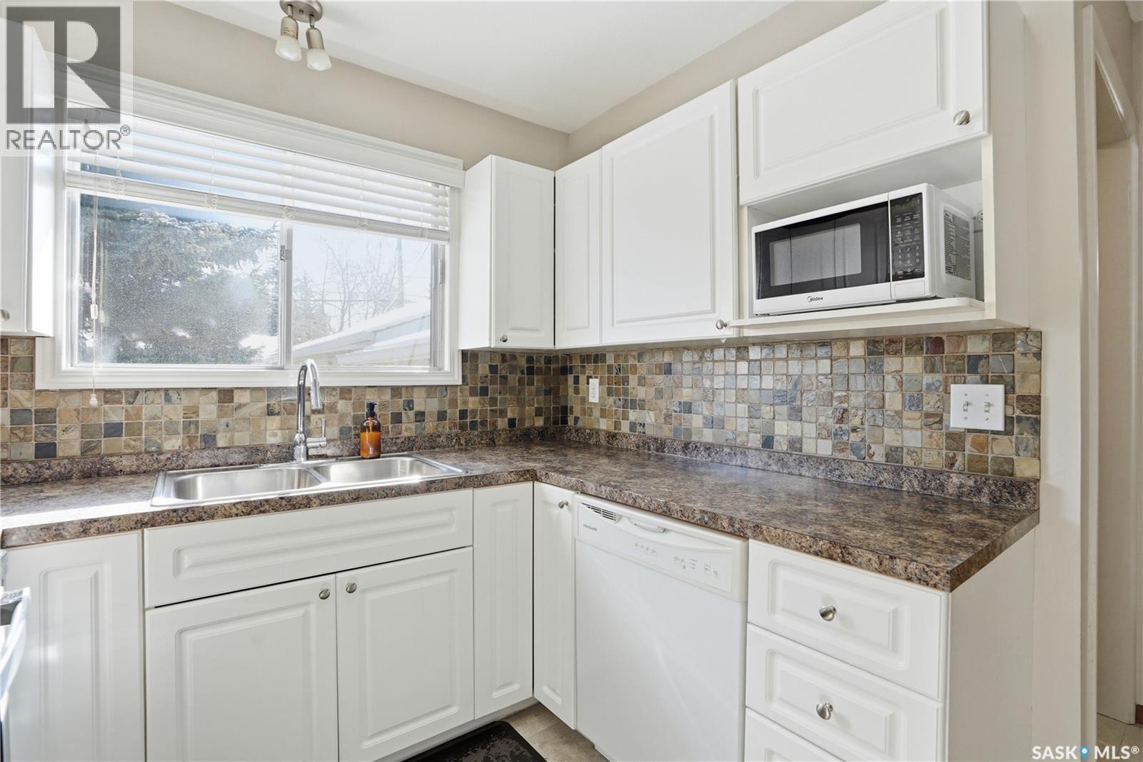 3A & 3B Bateman Crescent, Saskatoon, SK - Indoor Photo Showing Kitchen With Double Sink