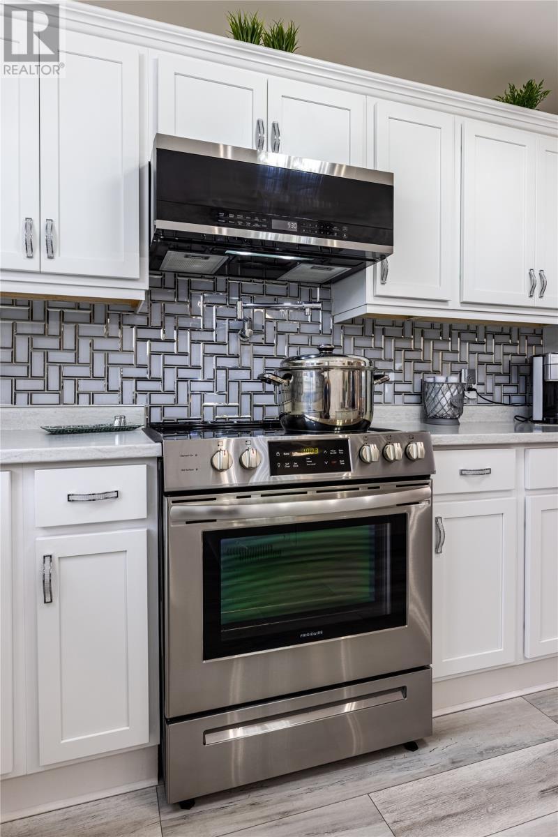 Stainless Steel Appliances / Pot Filler - 3 Lundrigans Road, Peters River, NL - Indoor Photo Showing Kitchen With Stainless Steel Kitchen