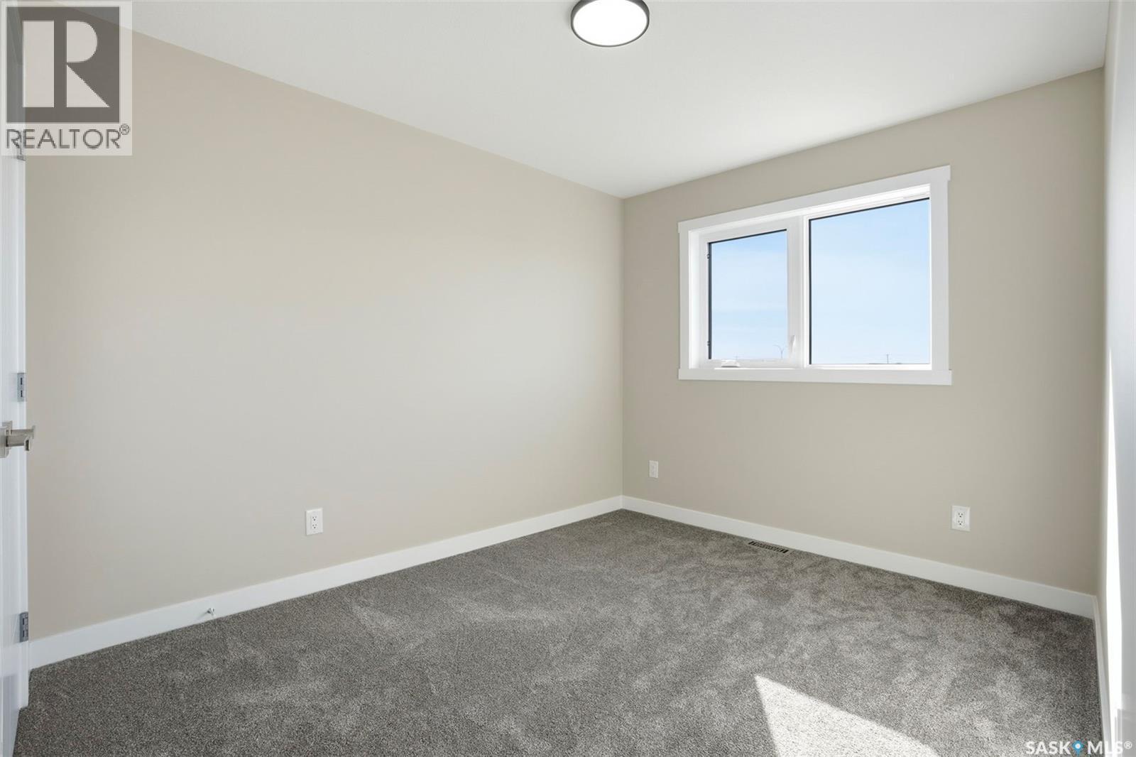 435 Sharma Crescent, Saskatoon, SK - Indoor Photo Showing Other Room