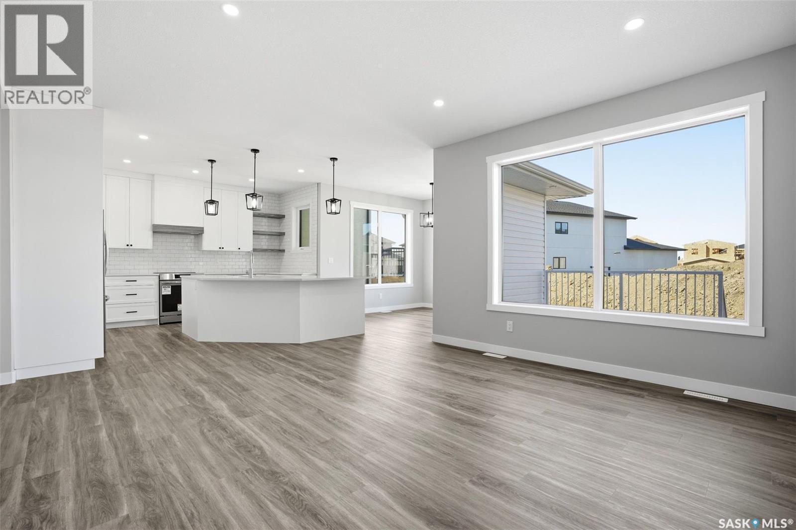 203 Sharma Lane, Saskatoon, SK - Indoor Photo Showing Kitchen With Upgraded Kitchen