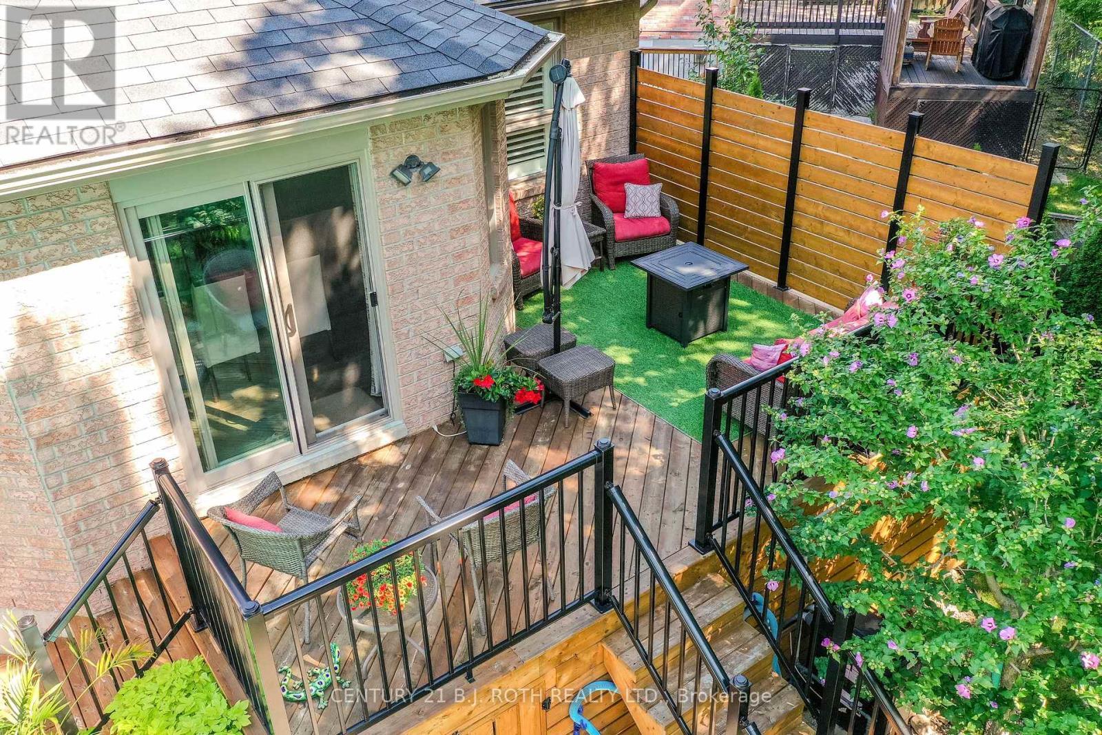 Walk out from kitchen to deck perfect for relaxing - 91 Benson Drive, Barrie, ON - Outdoor With Exterior
