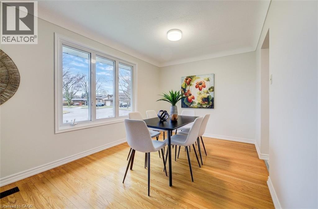 Dining room with easy access to kitchen and large window with loads of natural light - 66 Tupper Crescent, Kitchener, ON - Indoor Photo Showing Dining Room