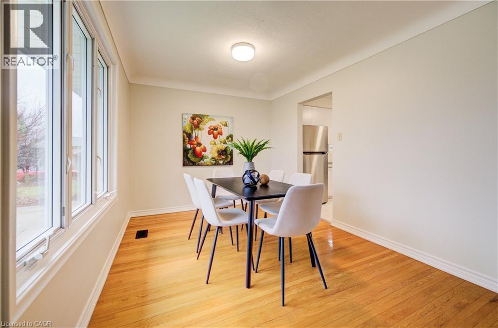 Dining room with easy access to kitchen and large window with loads of natural light - 66 Tupper Crescent, Kitchener, ON - Indoor Photo Showing Dining Room