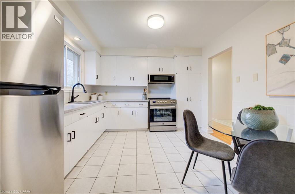 Spacious, eat-in kitchen, ample storage space, and brand new appliances. - 66 Tupper Crescent, Kitchener, ON - Indoor Photo Showing Kitchen