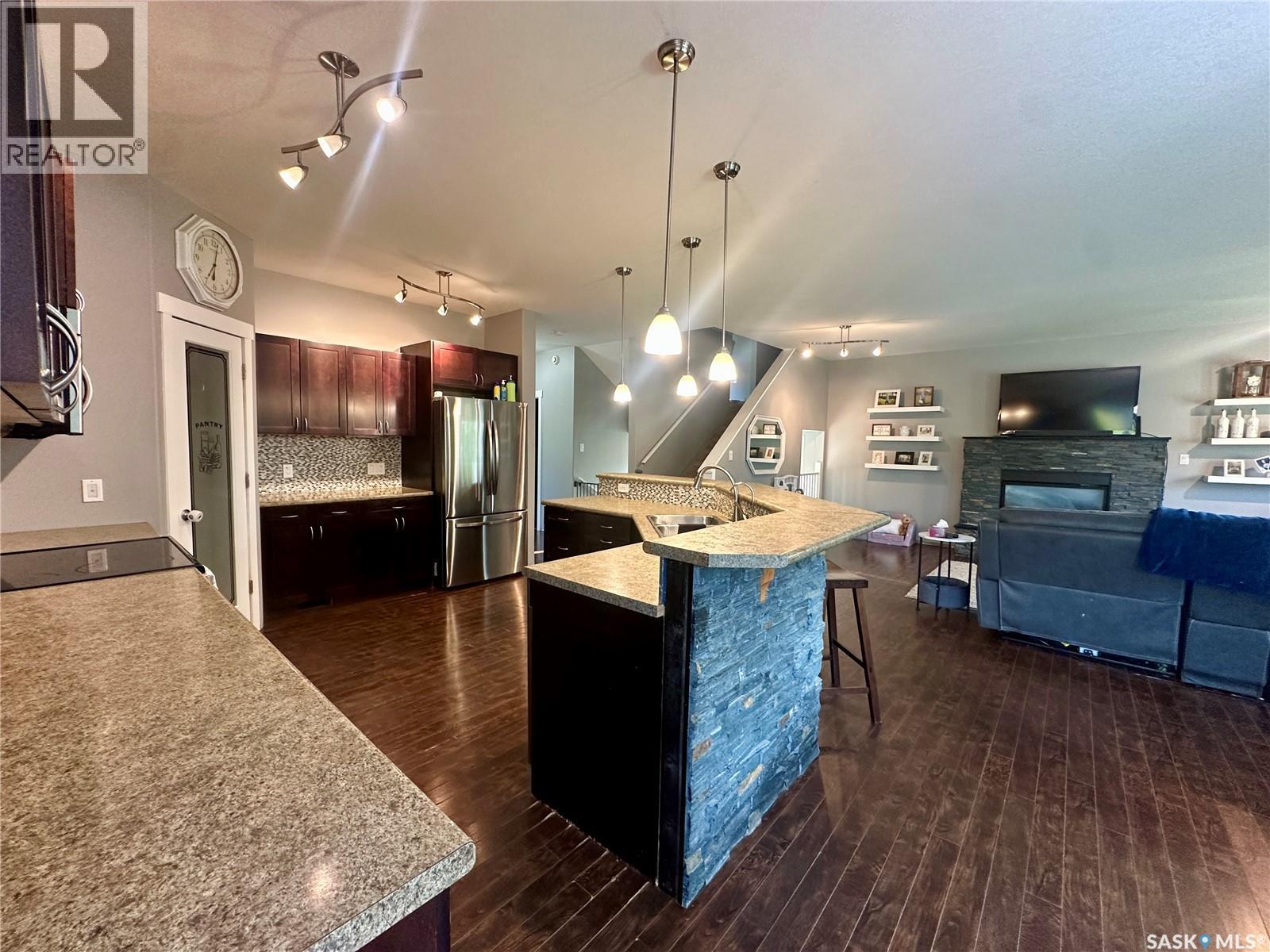 205 Roberts Avenue, Canora, SK - Indoor Photo Showing Kitchen With Fireplace With Upgraded Kitchen