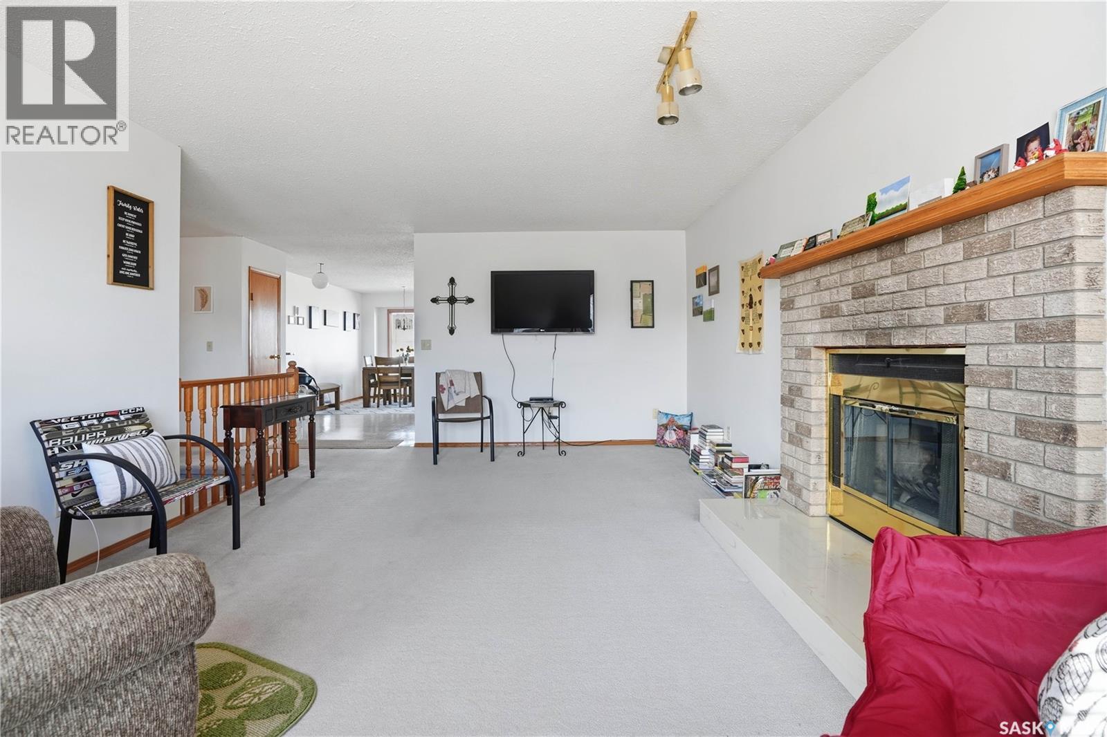 681 Canada Street, Central Butte, SK - Indoor Photo Showing Living Room With Fireplace
