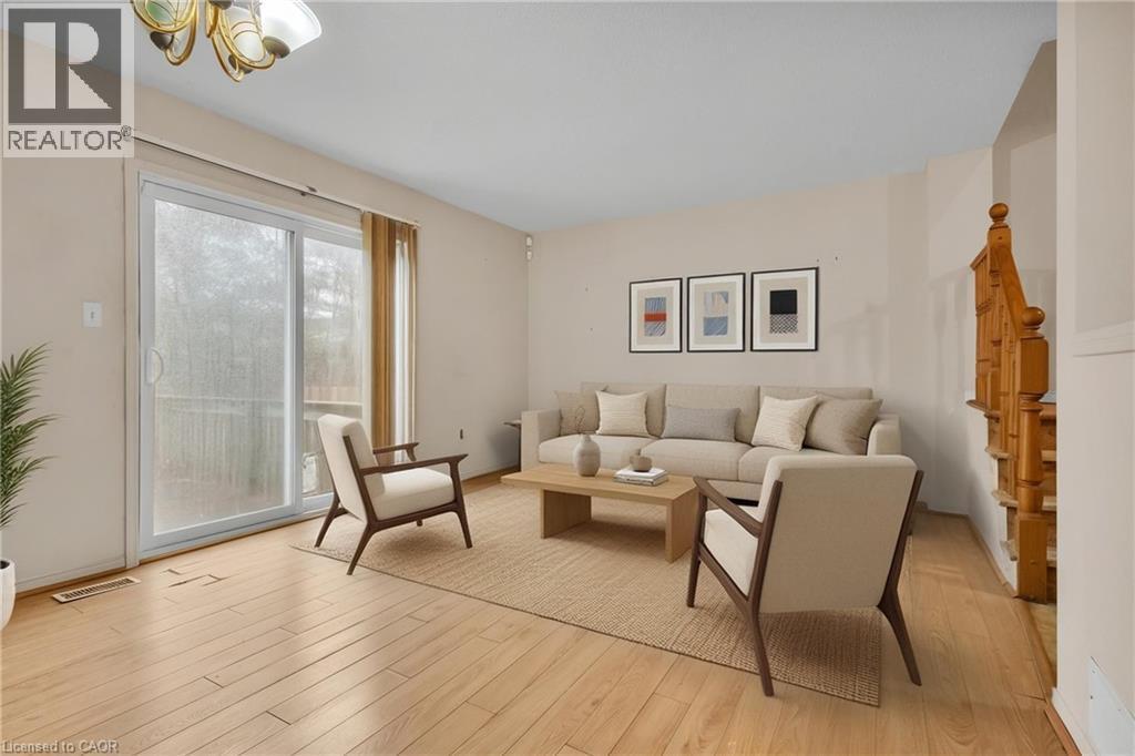 Living room with light wood-type flooring - 26 Roehampton Crescent, Guelph, ON - Indoor Photo Showing Living Room
