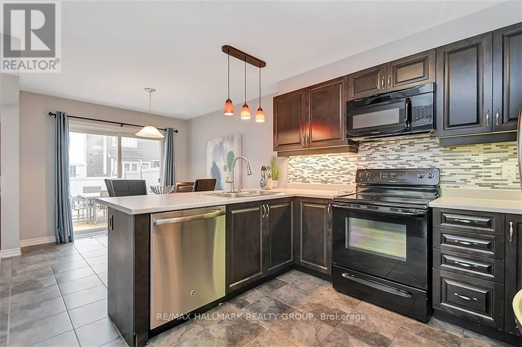 81 Switch Grass Crescent, Ottawa, ON - Indoor Photo Showing Kitchen With Double Sink