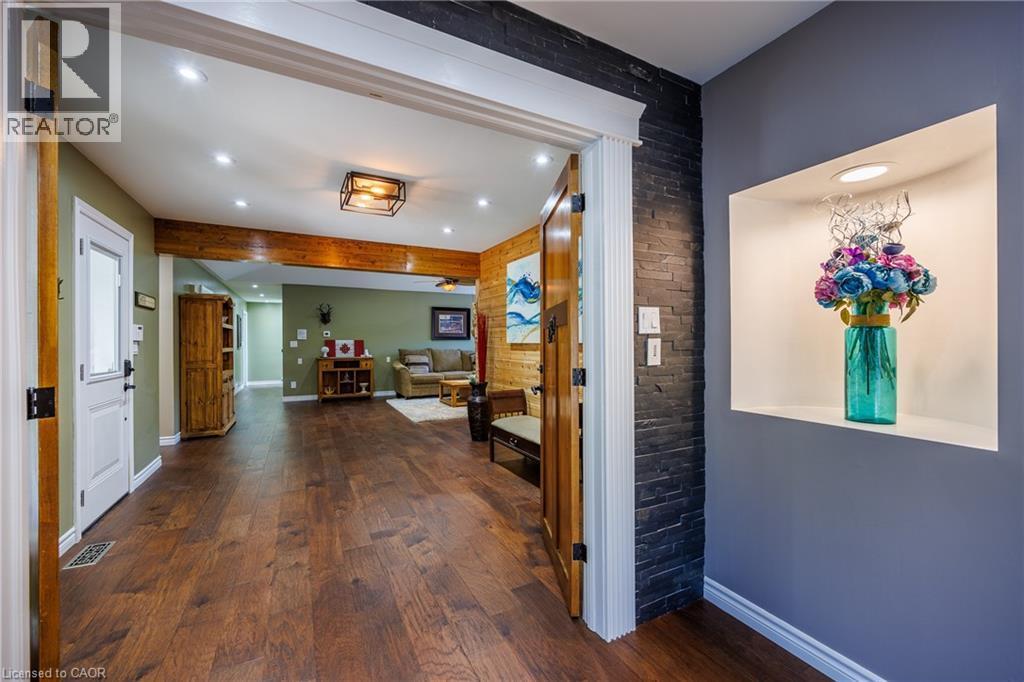 entrance to east end of home - 1285 Cockshutt Road, Simcoe, ON - Indoor Photo Showing Other Room