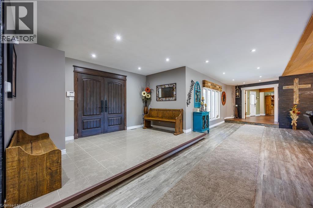 Foyer with light wood-style floors and recessed lighting - 1285 Cockshutt Road, Simcoe, ON - Indoor Photo Showing Other Room