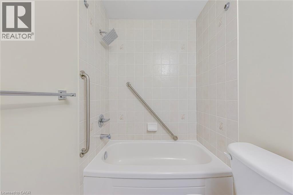 Bathroom featuring toilet and shower combination - 3037 Abernathy Way, Oakville, ON - Indoor Photo Showing Bathroom