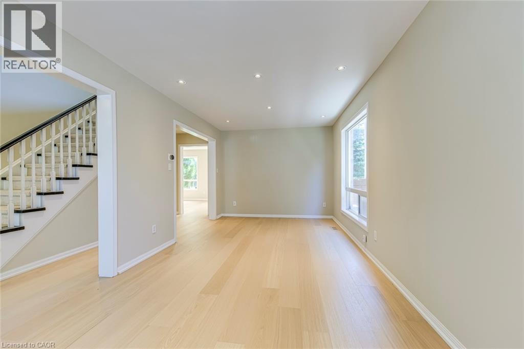 Living Room/Dining Room Combination with recessed lighting and light wood-style flooring - 3037 Abernathy Way, Oakville, ON - Indoor Photo Showing Other Room