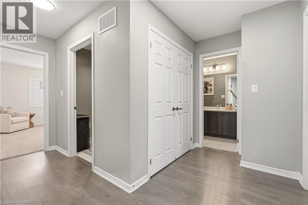 Hall featuring light wood finished floors - 105 Larry Crescent, Caledonia, ON - Indoor Photo Showing Other Room