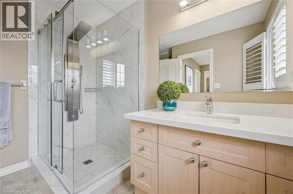 Bathroom featuring a marble finish shower and vanity - 512 Wood Nettle Way, Waterloo, ON - Indoor Photo Showing Bathroom