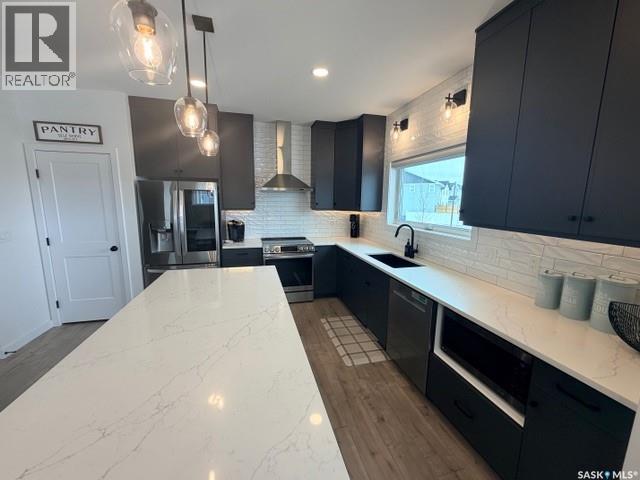 351 Aniskotaw Bend, Saskatoon, SK - Indoor Photo Showing Kitchen With Upgraded Kitchen