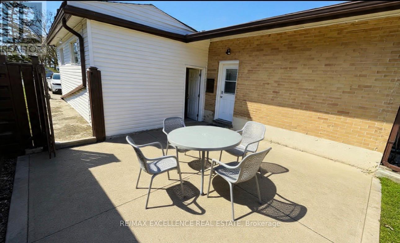 Backyard + Side Entrance - 35 Siebert Avenue, Kitchener, ON - Outdoor With Exterior