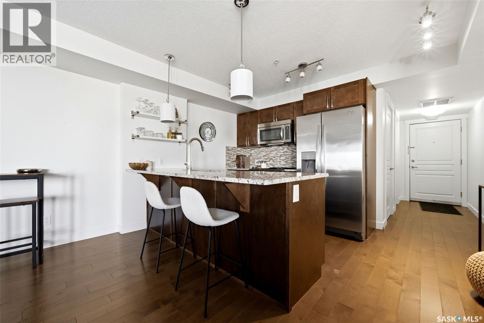 312 5301 Universal Crescent, Regina, SK - Indoor Photo Showing Kitchen With Upgraded Kitchen