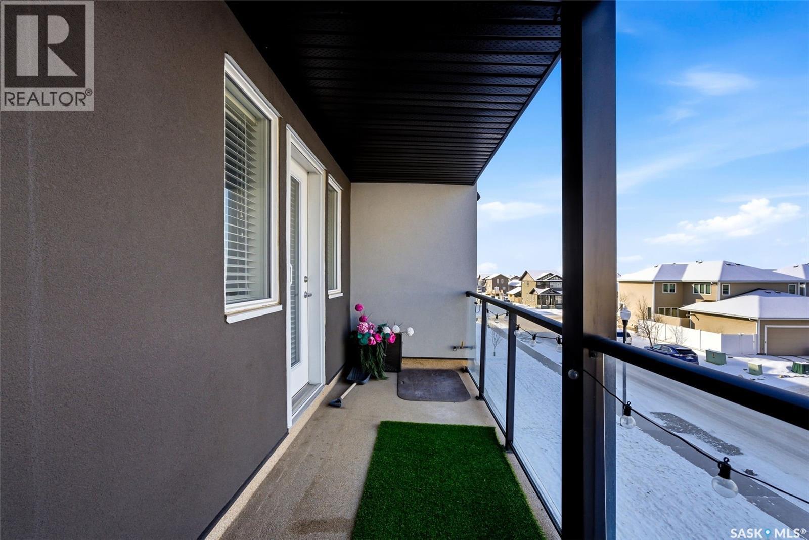 312 5301 Universal Crescent, Regina, SK - Outdoor With Balcony With Exterior