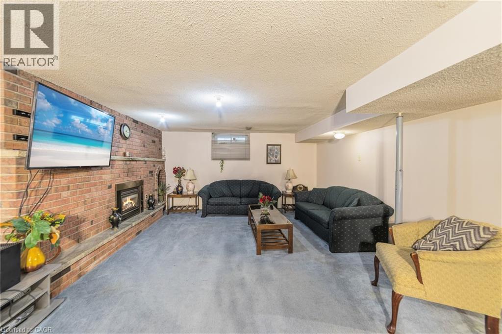 122 Greencedar Drive, Hamilton, ON - Indoor Photo Showing Living Room With Fireplace