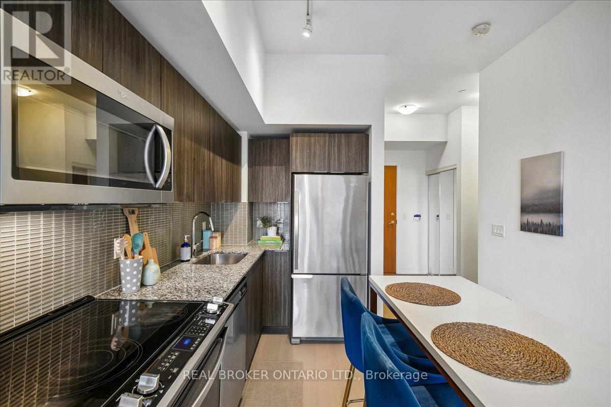 603 - 20 Shore Breeze Drive, Toronto, ON - Indoor Photo Showing Kitchen With Stainless Steel Kitchen With Upgraded Kitchen
