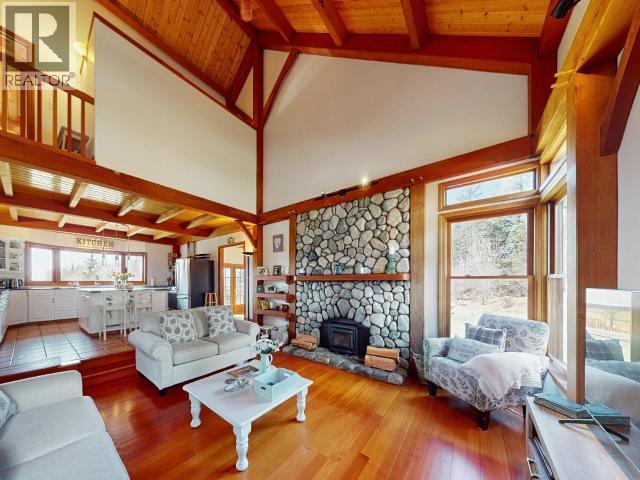 3749 Highway 101, Powell River, BC - Indoor Photo Showing Living Room With Fireplace