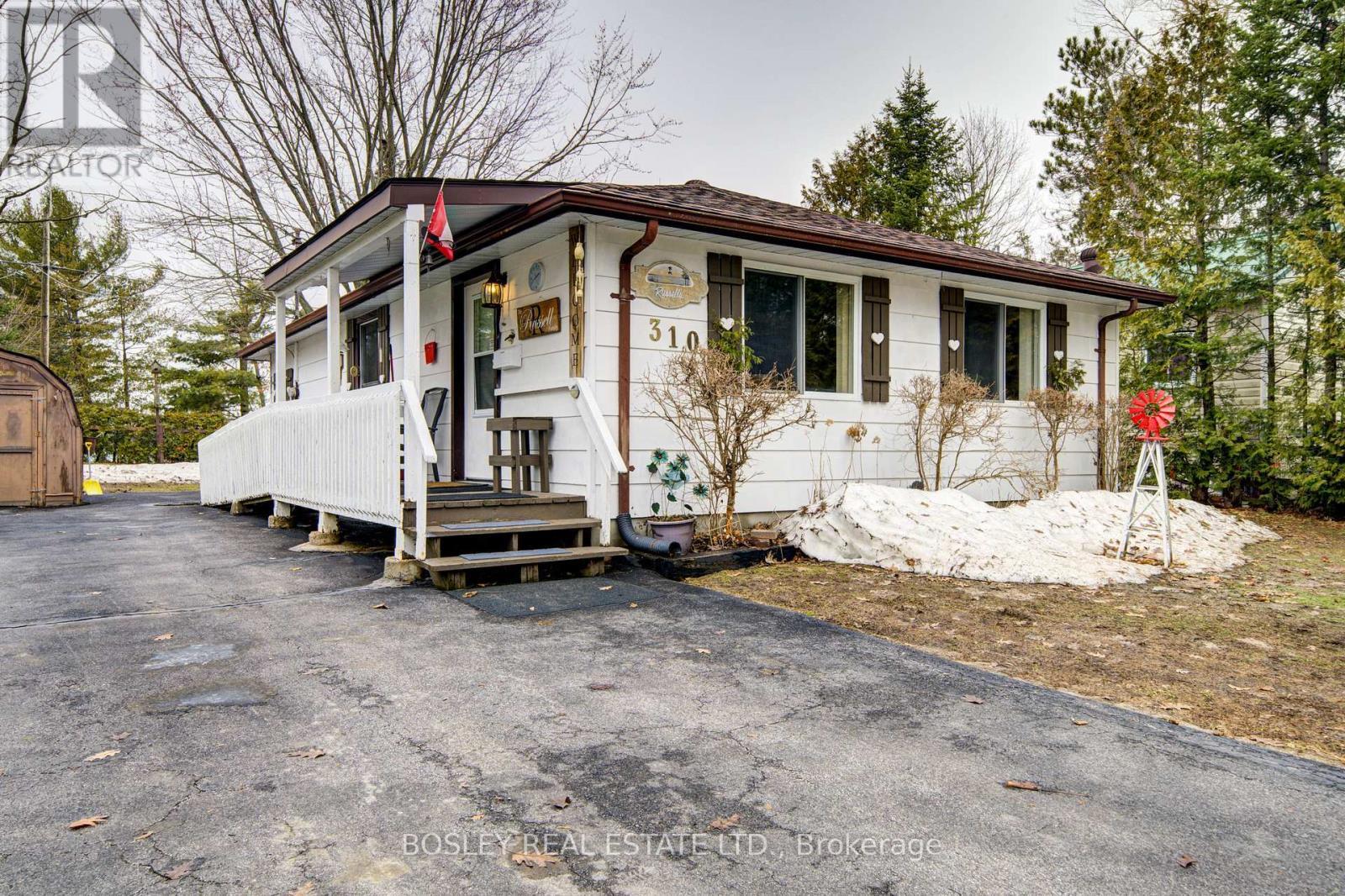 310 Tiny Beaches Road S, Tiny, ON - Outdoor With Facade