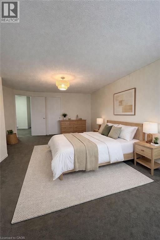 Primary Bedroom Virtually Staged - 318 Sable Court, Waterloo, ON - Indoor Photo Showing Bedroom