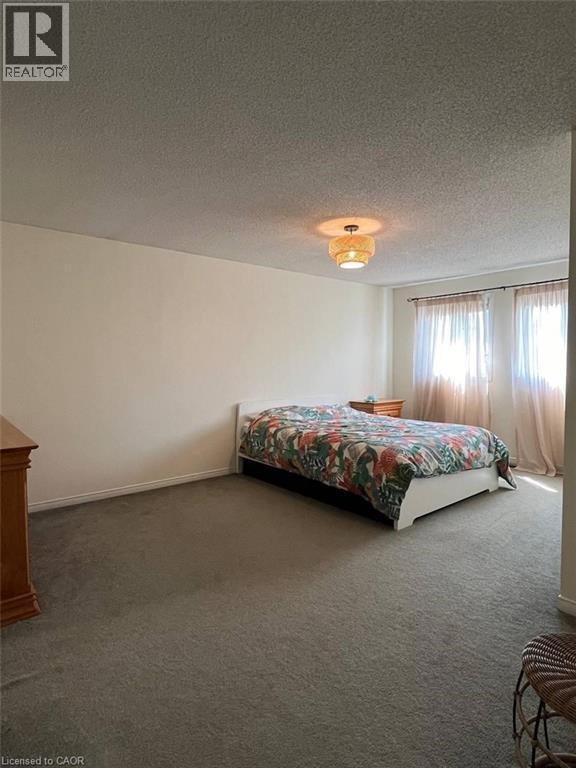 Priamry Bedroom - 318 Sable Court, Waterloo, ON - Indoor Photo Showing Bedroom