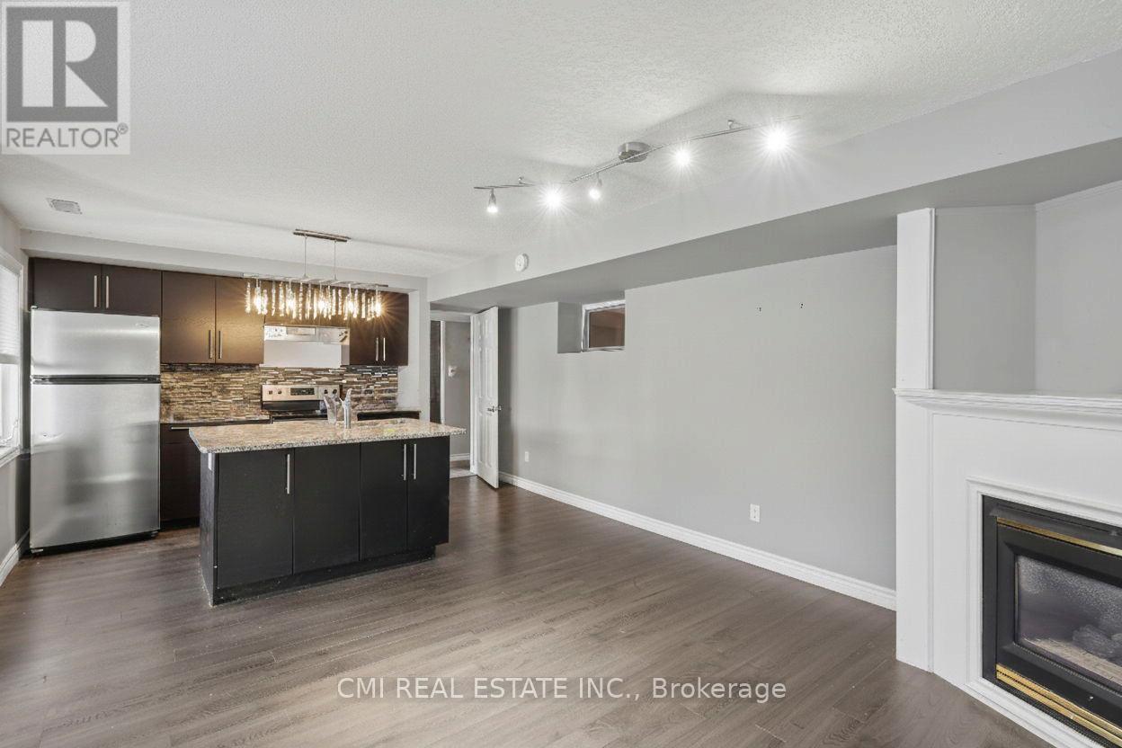 360 Culpepper Place, Waterloo, ON - Indoor Photo Showing Kitchen With Fireplace