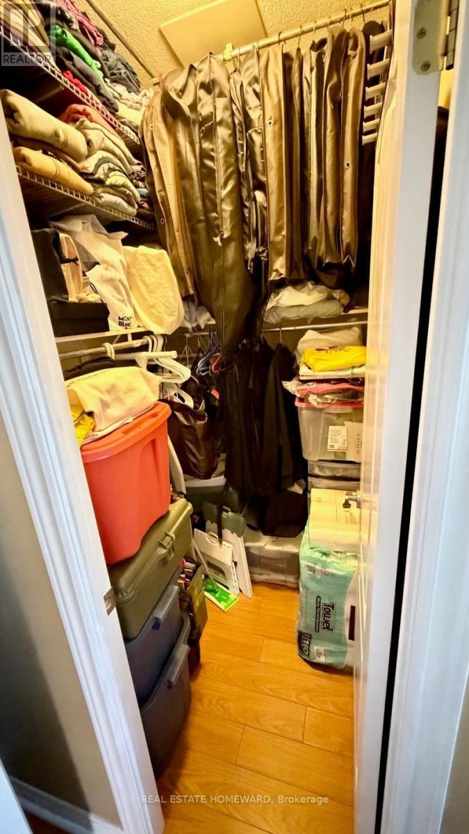 Walk in closet. - 108 - 50 Disera Drive, Vaughan, ON - Indoor Photo Showing Kitchen With Double Sink