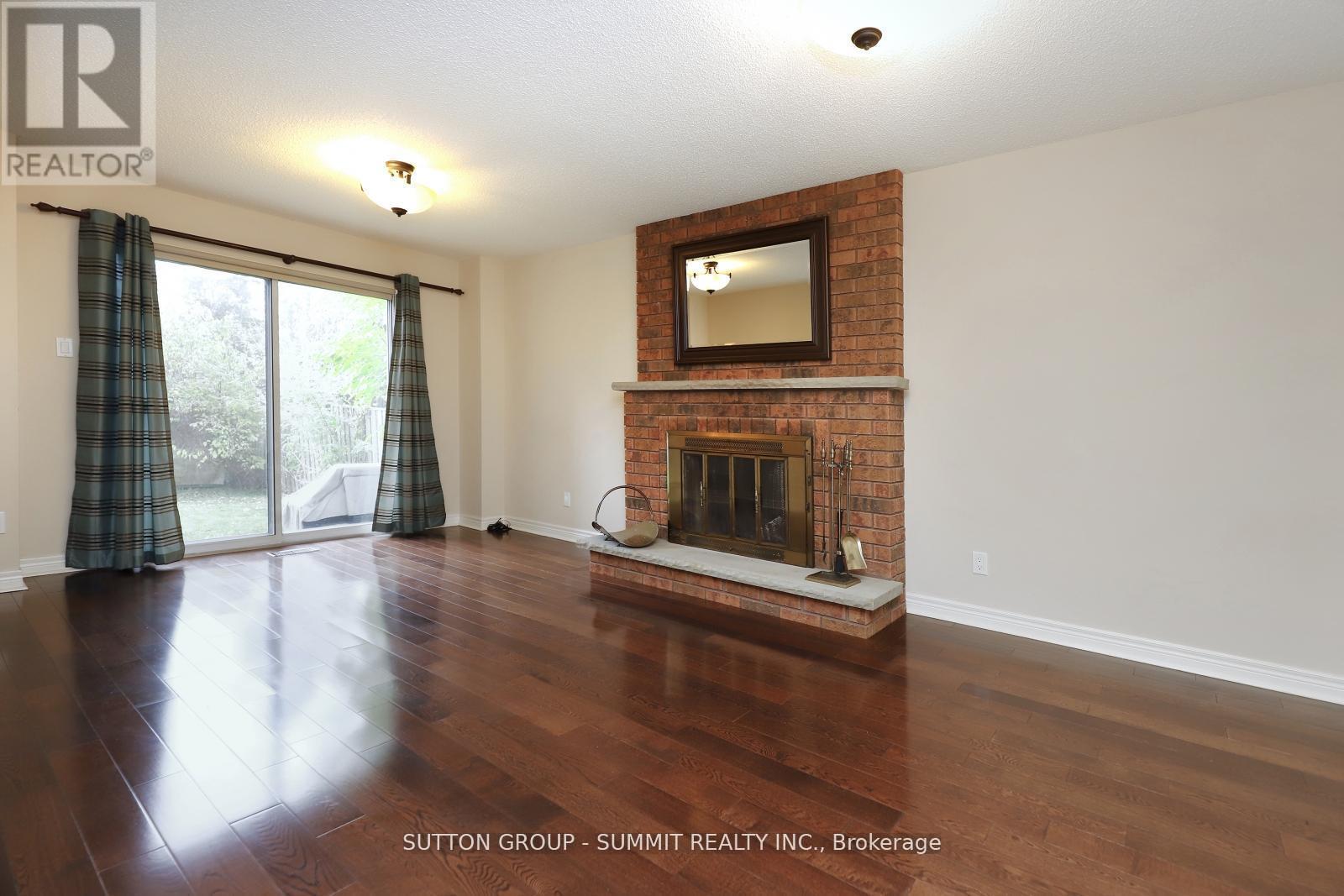 2654 Ambercroft Trail, Mississauga, ON - Indoor Photo Showing Living Room With Fireplace