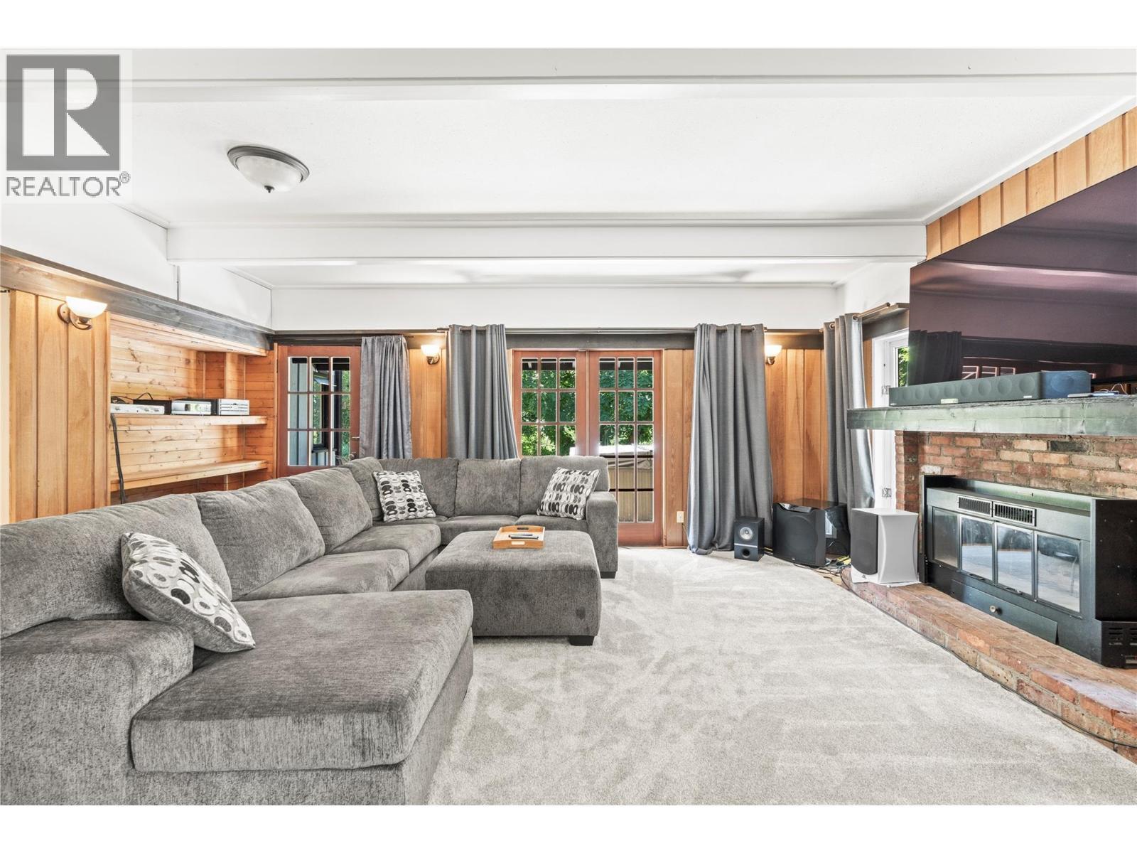 Primary Home Second Living Room - 1451 Mountview Road, Vernon, BC - Indoor Photo Showing Living Room With Fireplace