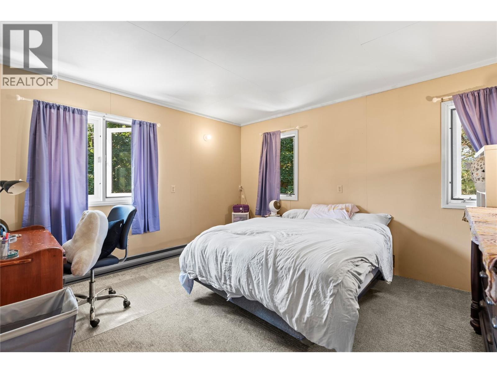 Primary Home Bed 4 - 1451 Mountview Road, Vernon, BC - Indoor Photo Showing Bedroom