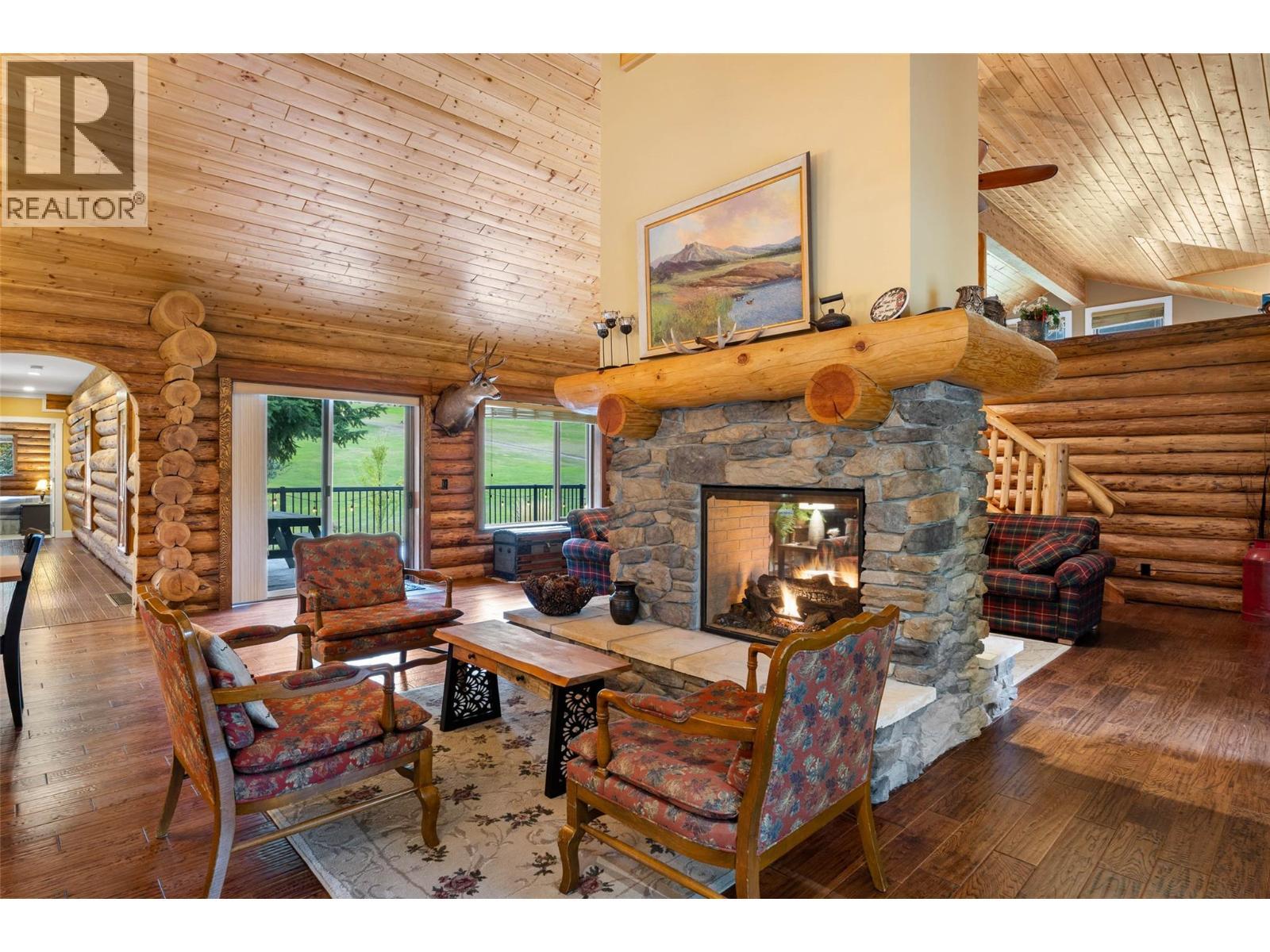 7799 Golf Course Road, Anglemont, BC - Indoor Photo Showing Living Room With Fireplace