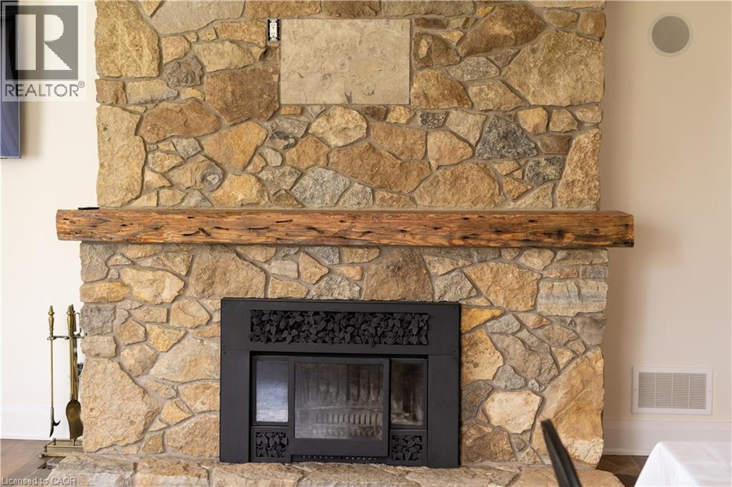 wood fireplace - 2019 Dundas Street, Burlington, ON - Indoor Photo Showing Living Room With Fireplace