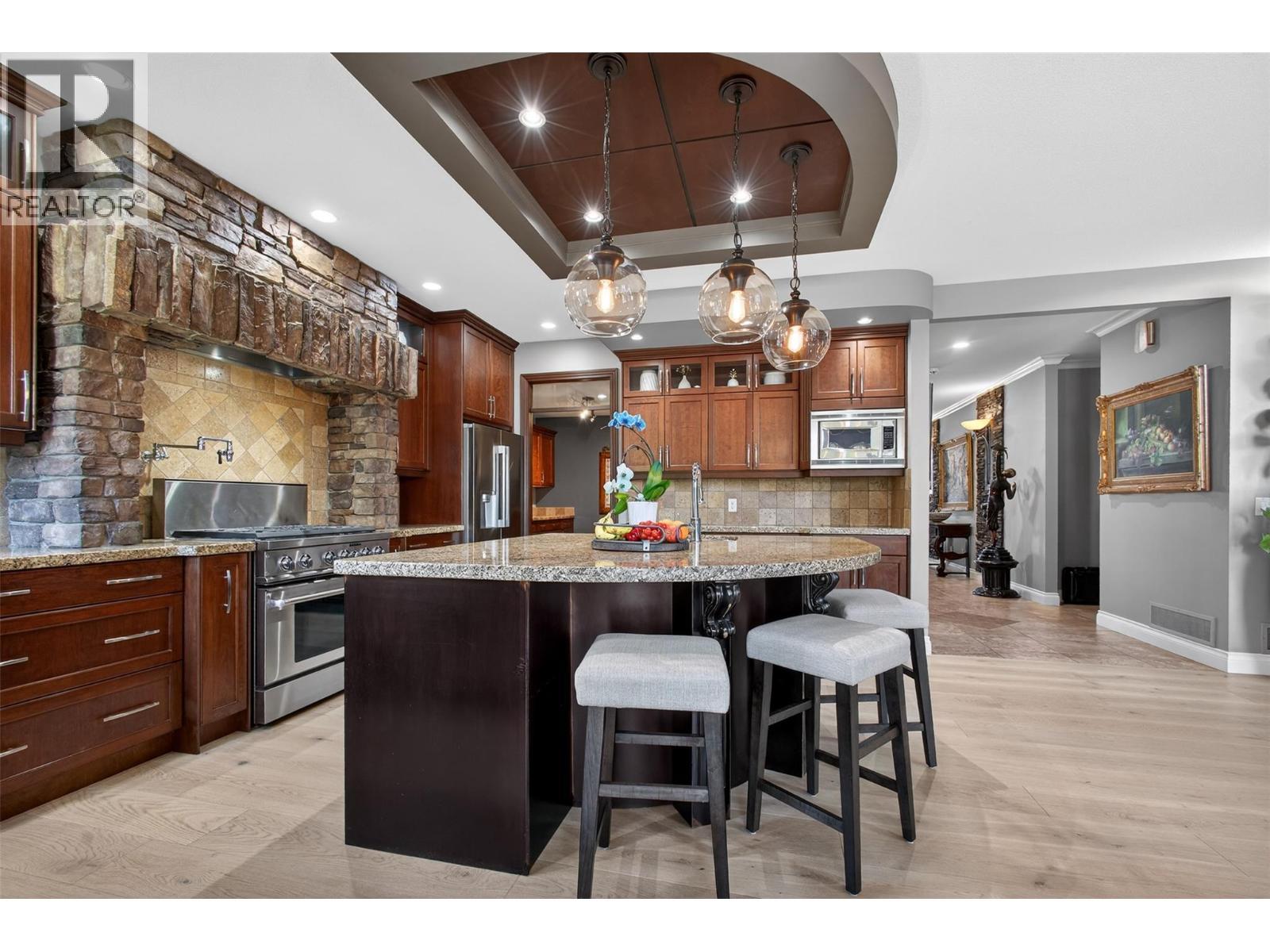 With an concrete patio - 336 Quilchena Drive, Kelowna, BC - Outdoor With Deck Patio Veranda