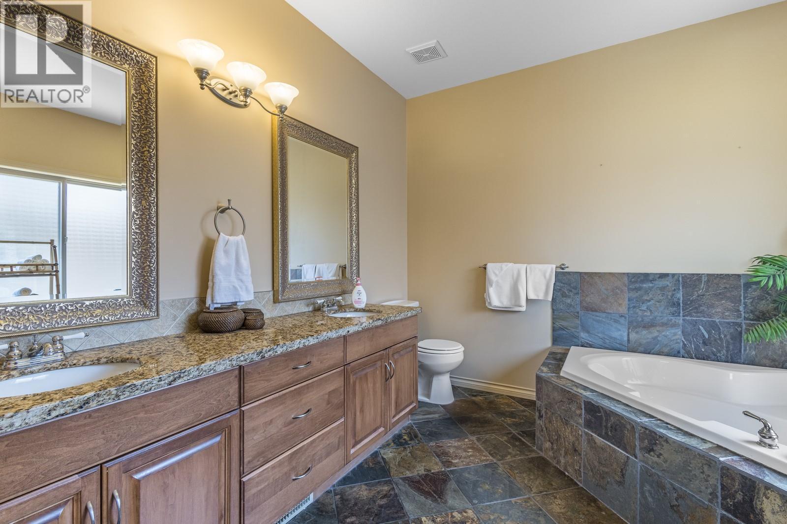 5 piece ensuite - 610 Arrowleaf Lane, Kelowna, BC - Indoor Photo Showing Bathroom