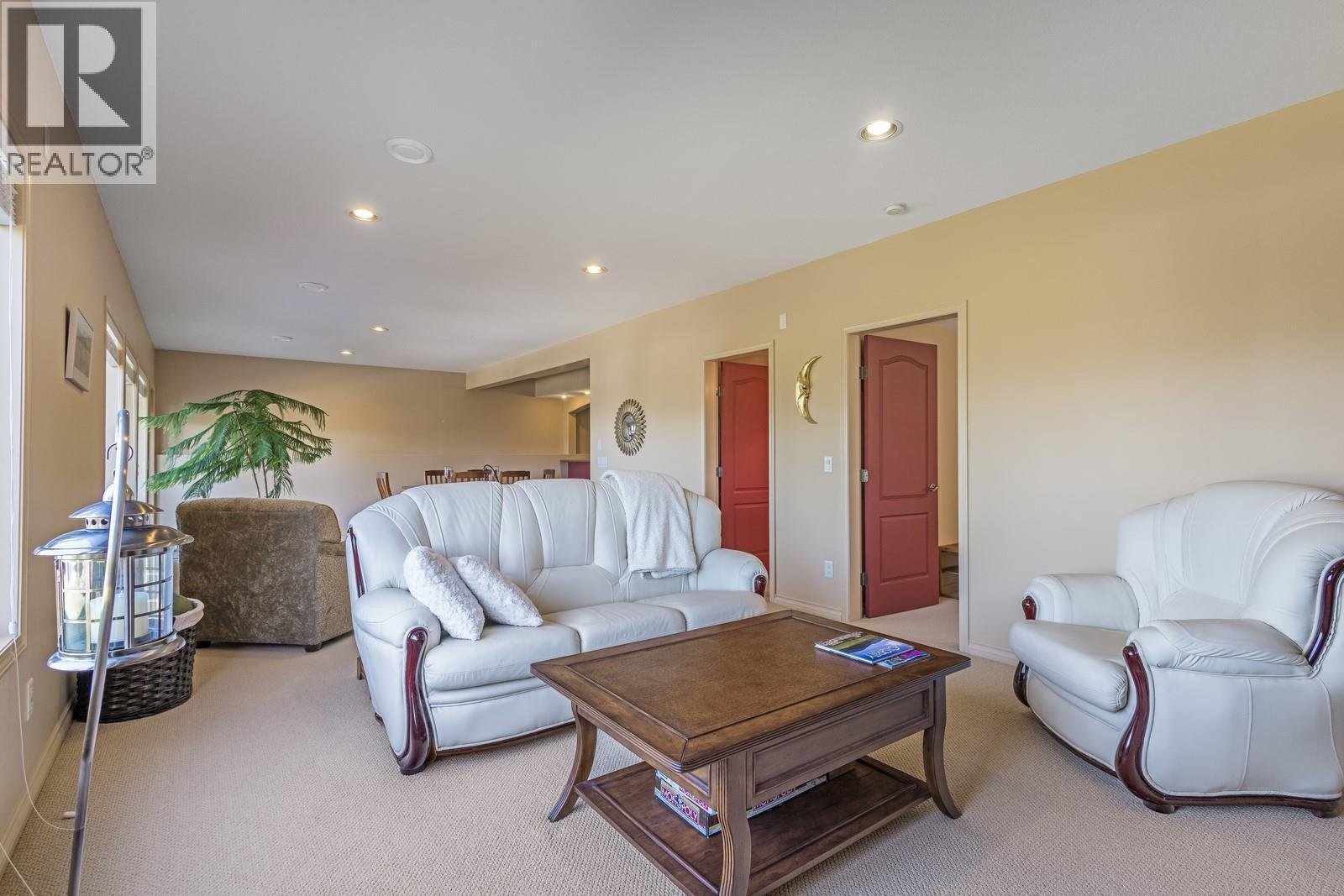 Lower level family room - 610 Arrowleaf Lane, Kelowna, BC - Indoor Photo Showing Living Room