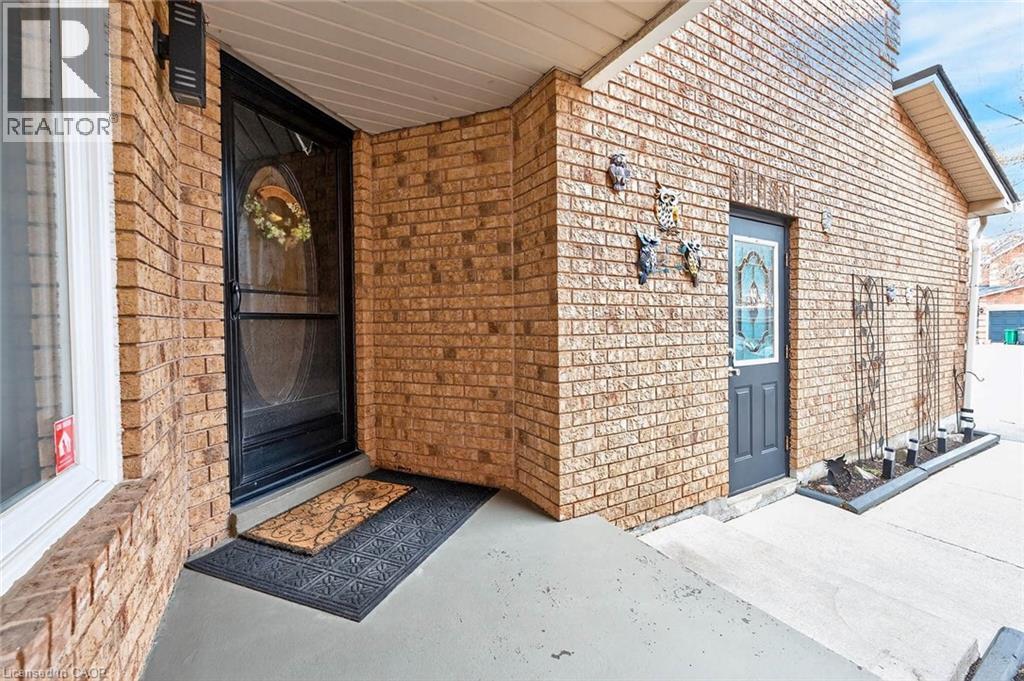 View of exterior entry featuring brick siding - 3753 Densbury Drive, Mississauga, ON - Outdoor With Exterior